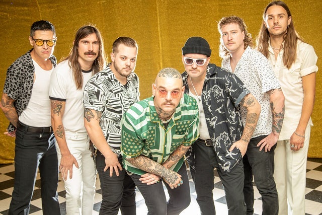 v-shape portrait of 6 band members and lead singer Rootbeer Richie.